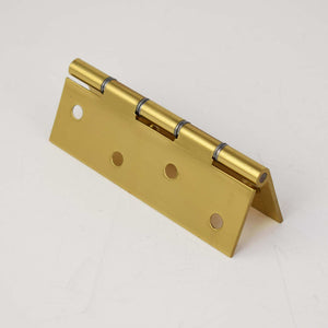 Single brass polished hinge