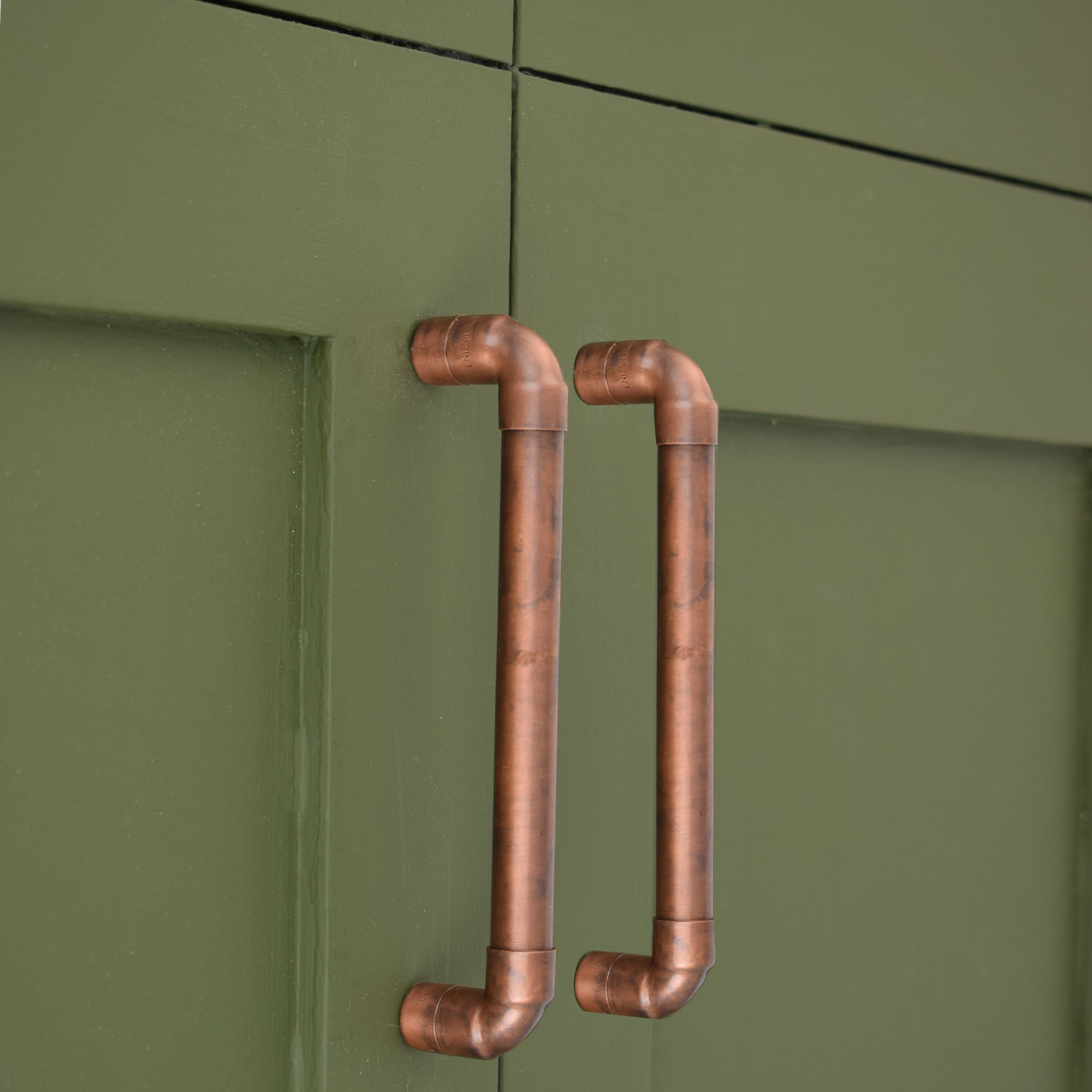Aged Copper U-Pull Handle - On Green Cabinet