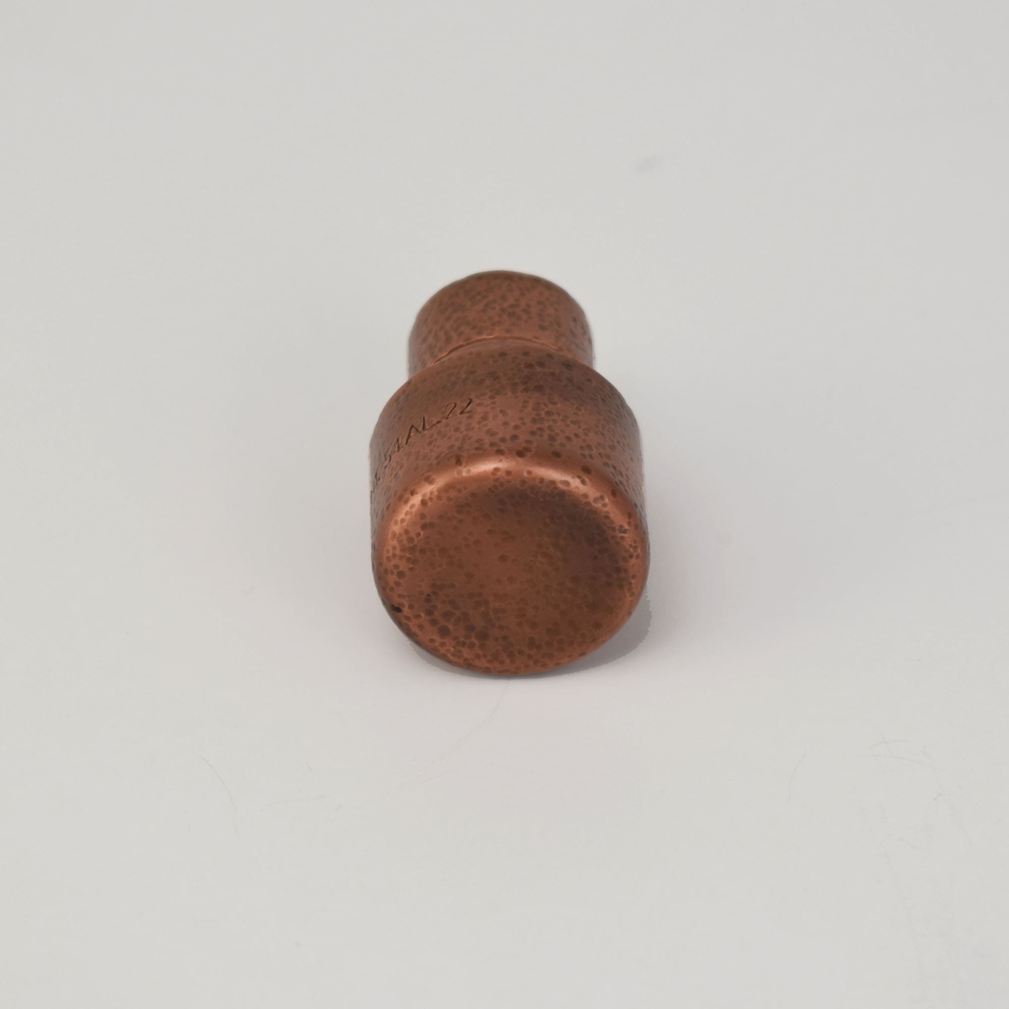 Aged Copper Raised Dimple Knob - On White Surface