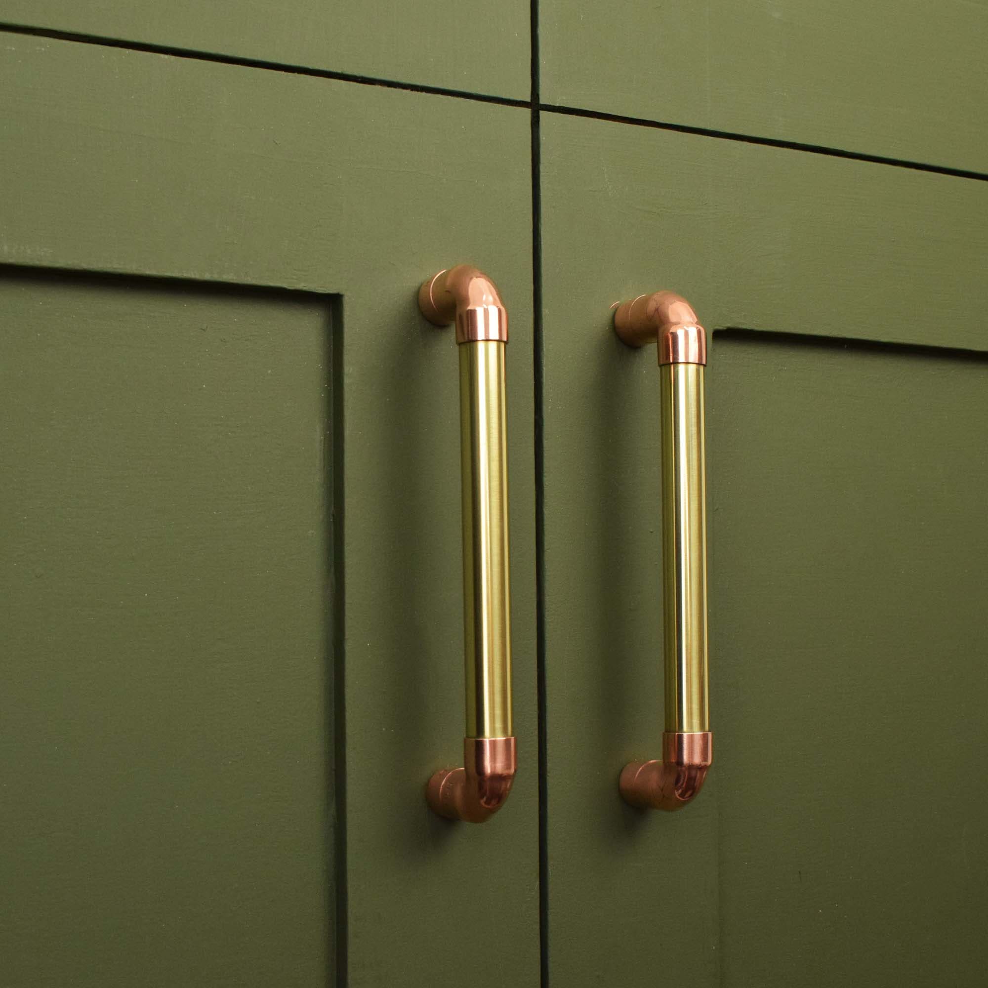 Brass U-Pull Handle with Copper Detail - On Green Cabinet