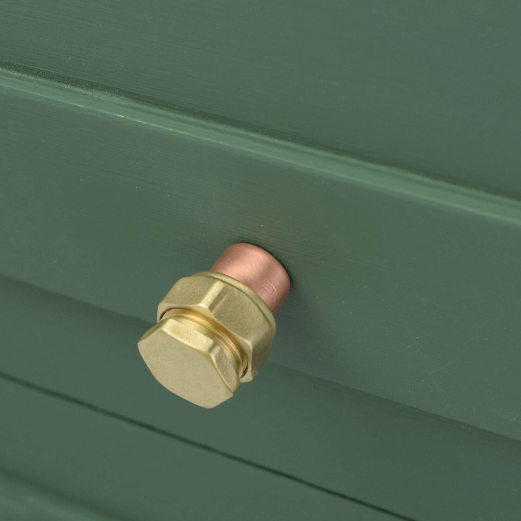 Copper and brass raised knob bolt