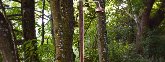 Copper shower in forest