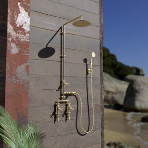 Brass shower on wooden shack
