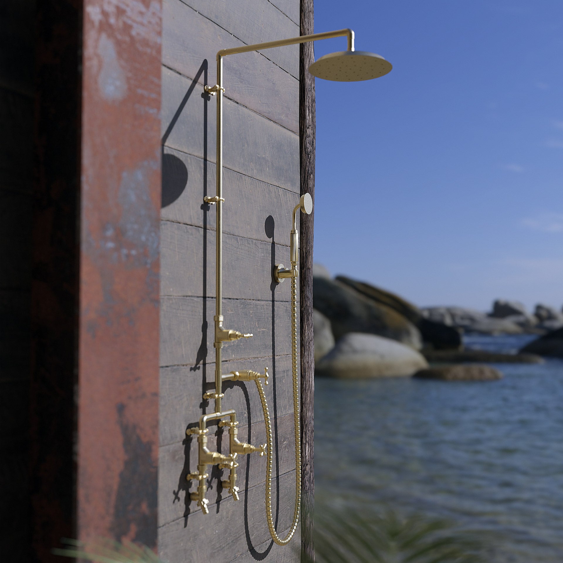 Brass shower by seafront