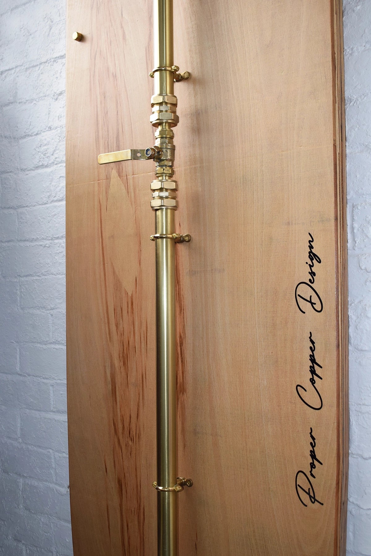 Close-up of brass shower valve