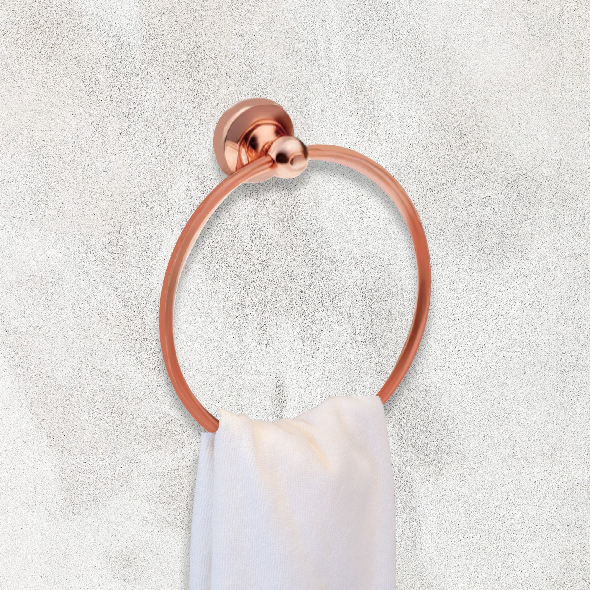 copper towel ring with a white towel on a light gray background, heritage bathroom