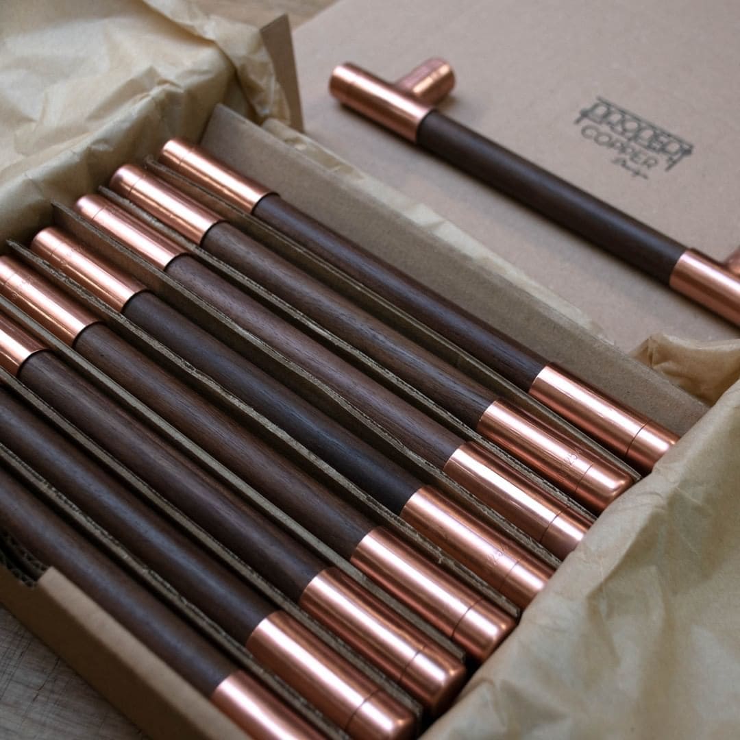 Box of copper and wood handles