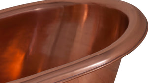 Copper bathtub close upon a white background