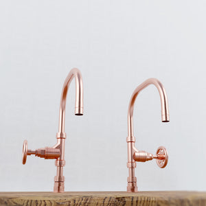 Coral twin copper taps front angle