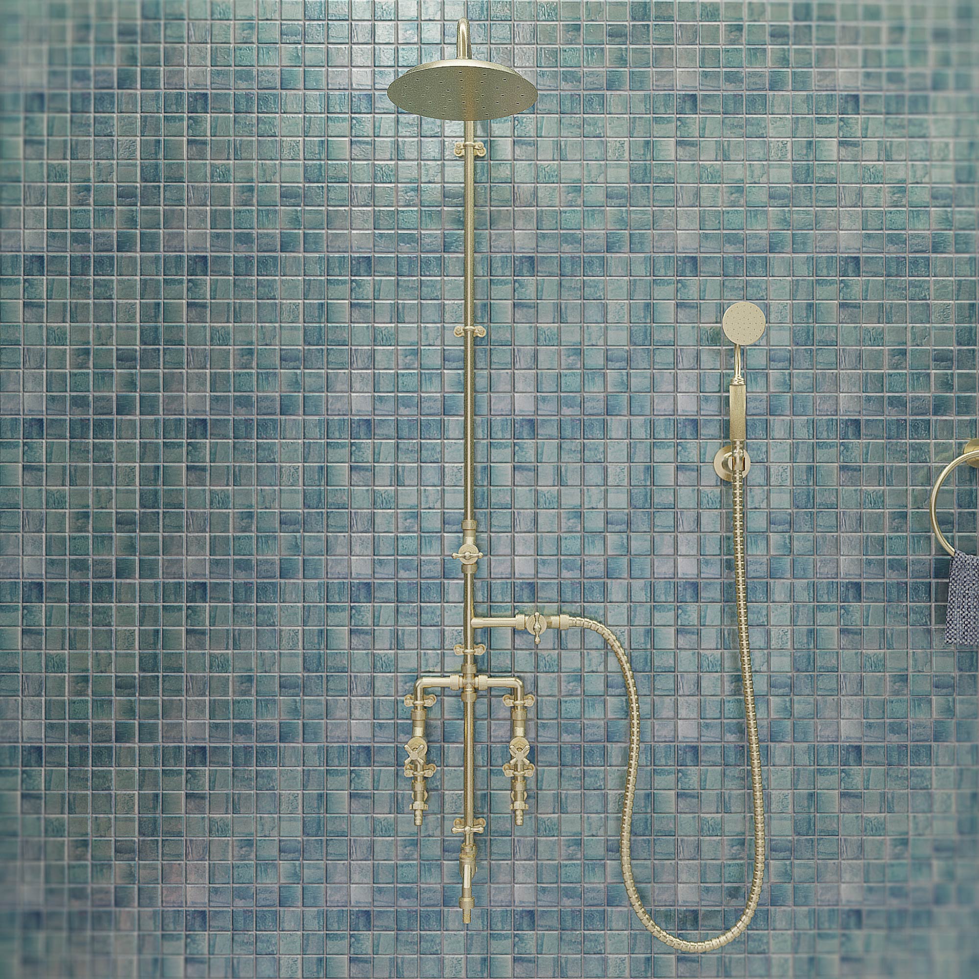 Brass Seducto shower on blue tiles