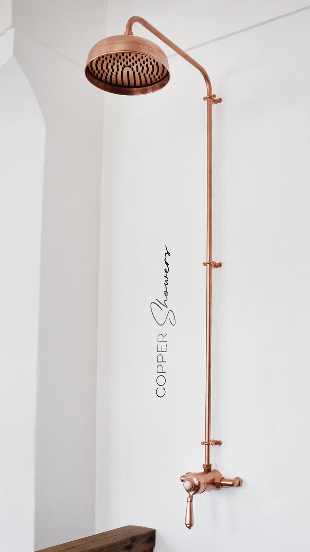 Thermostatic shower system in a copper finish