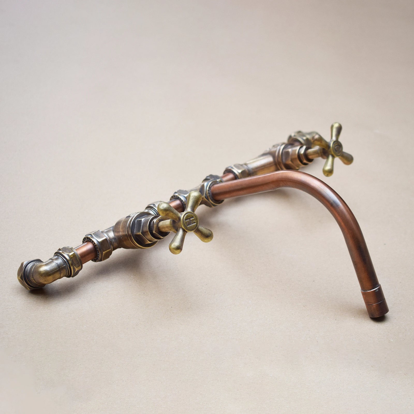 Aged copper and brass tap angled view