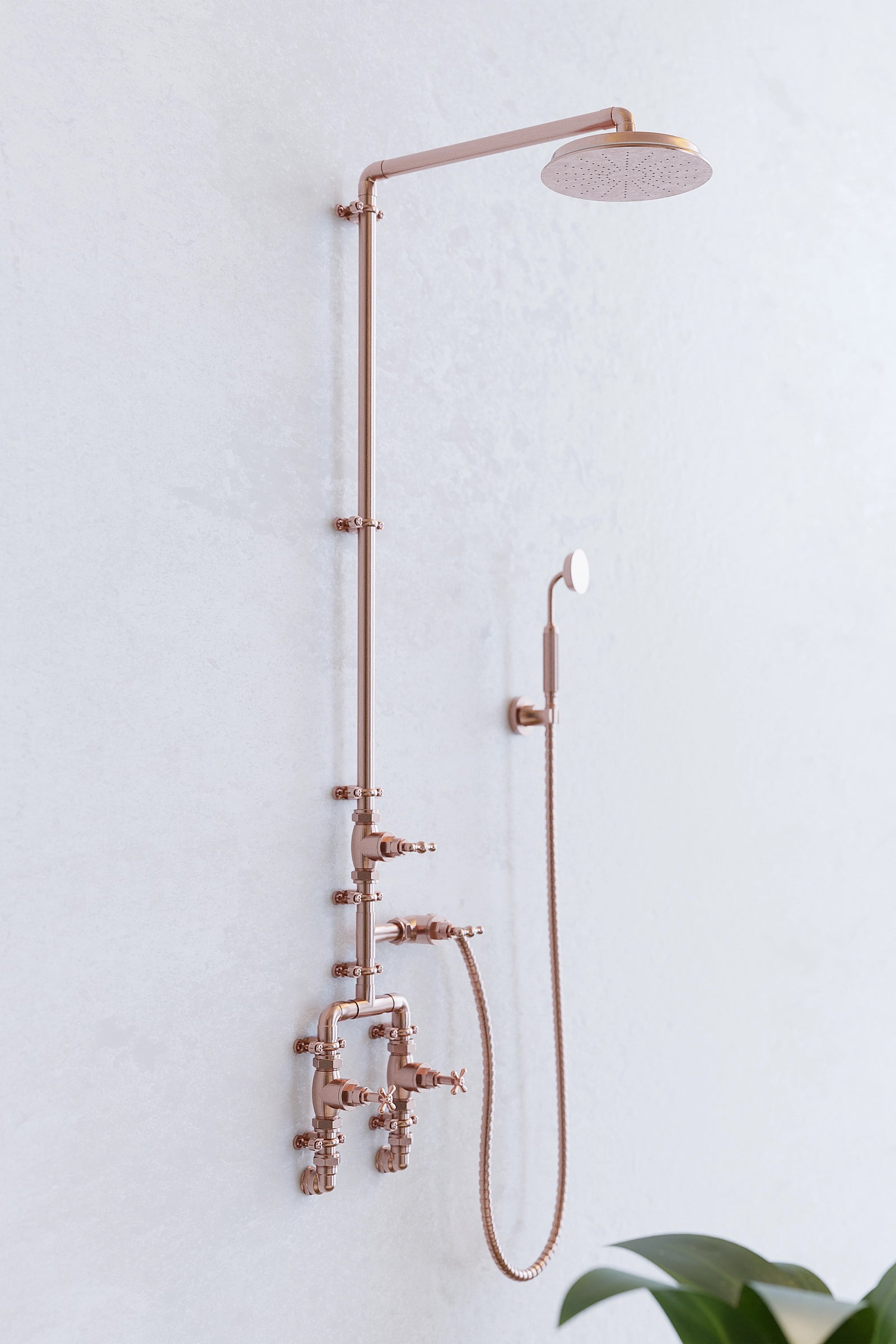 Copper shower on white backdrop at angle