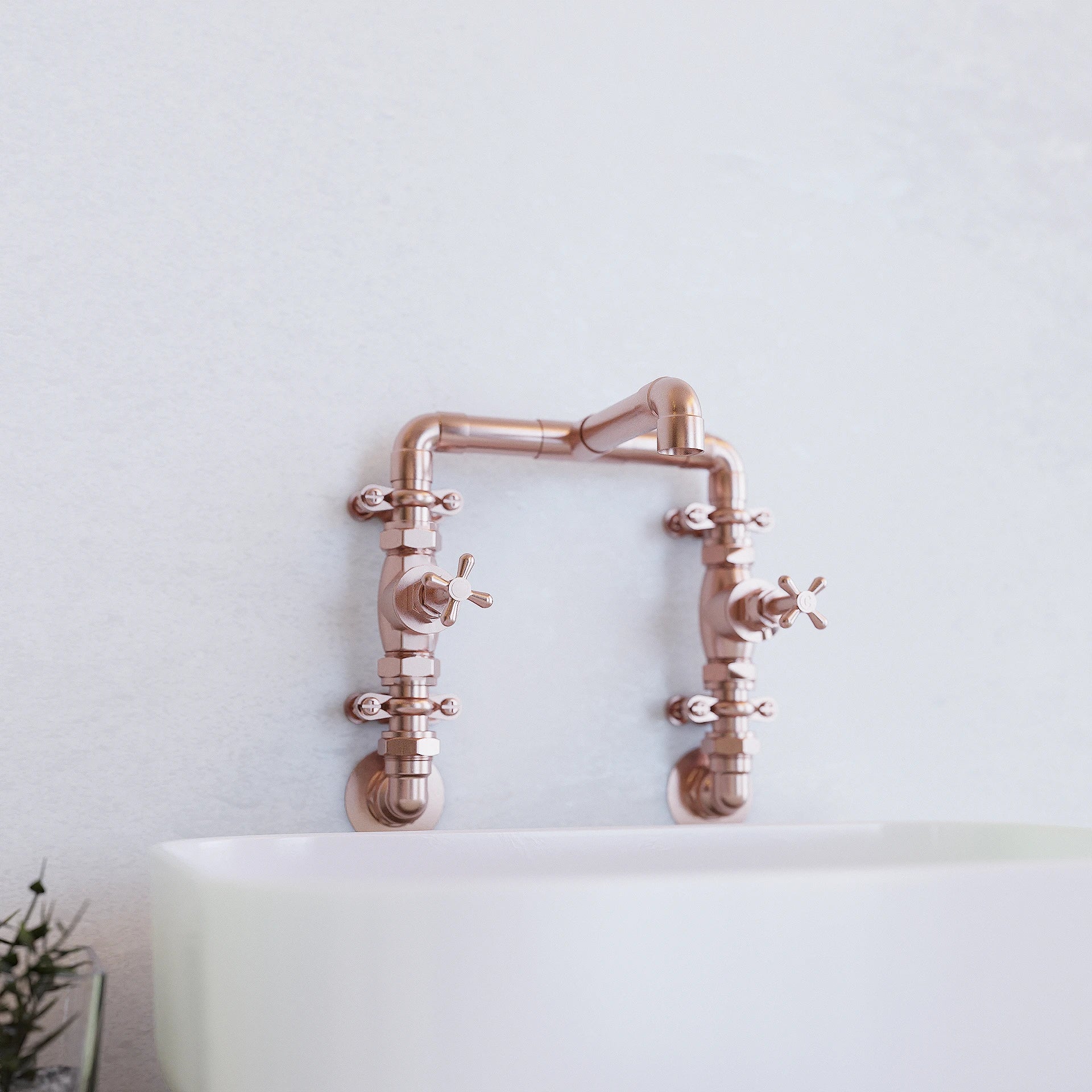 Wall mounted copper hot and cold mixer in bathroom