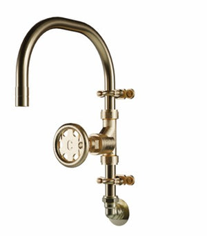 Brass wall-mounted kitchen faucet on a white background