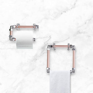 Towel holder with toilet paper holder on a marble background