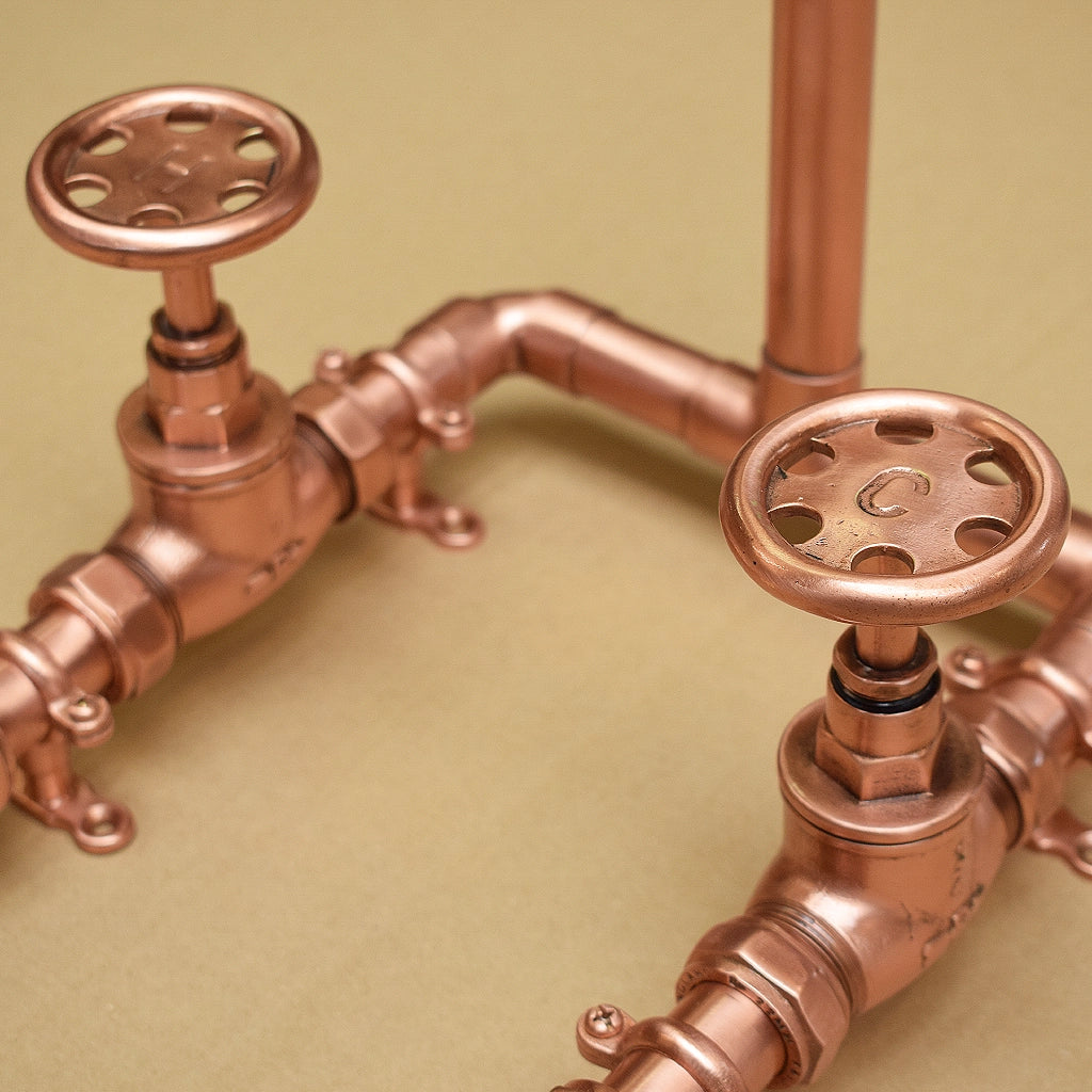 Circular copper tap close-up