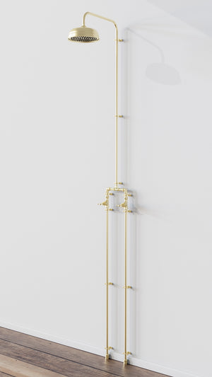 Brass full-length shower on white wall