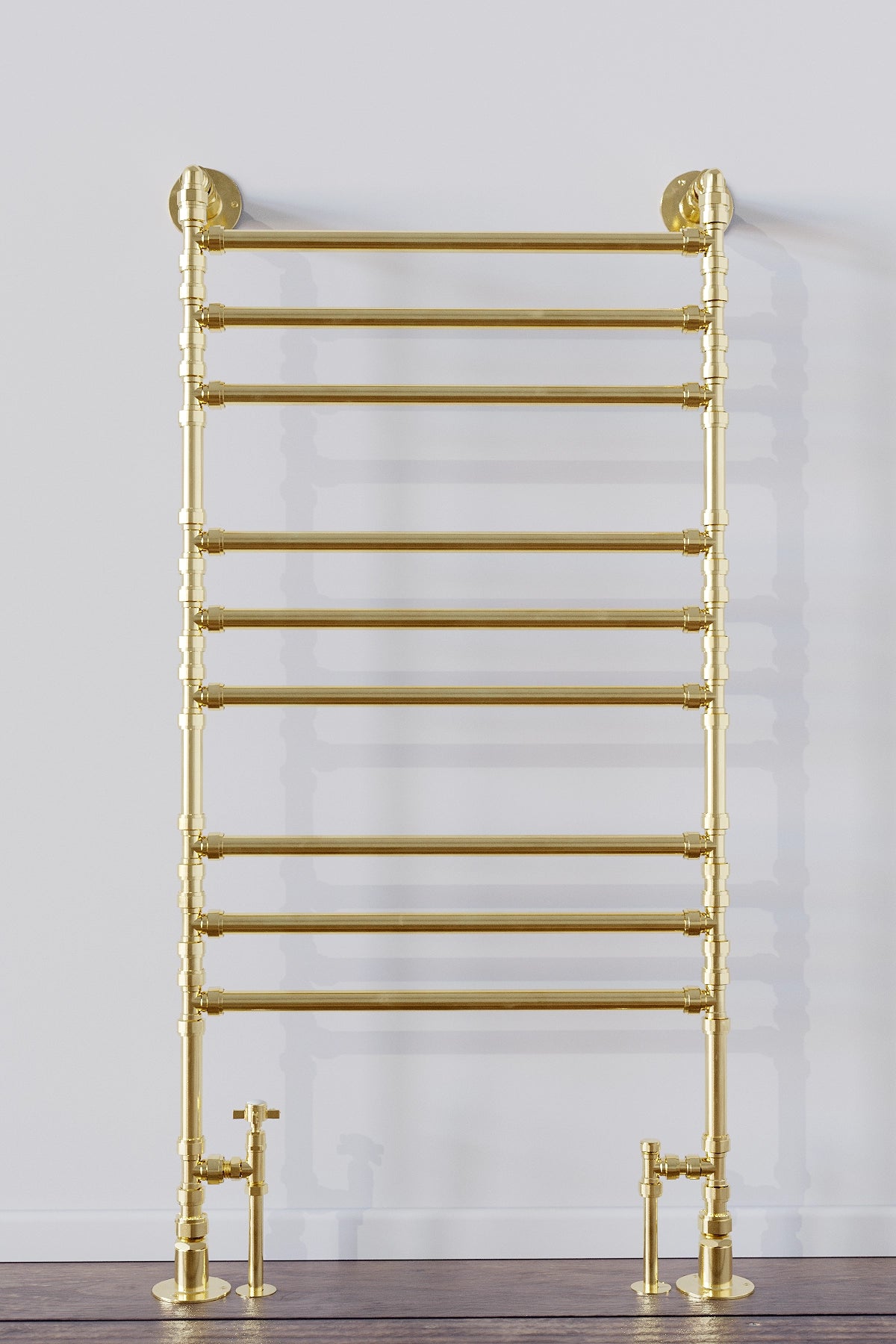 Brass towel ladder in bathroom