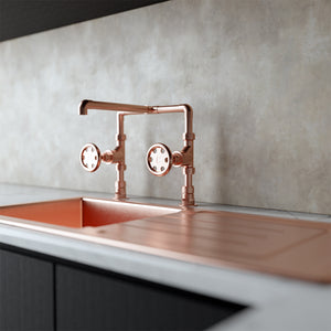 Copper tap with copper sink in kitchen