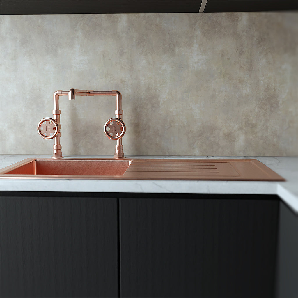 Copper tap and sink in home kitchen