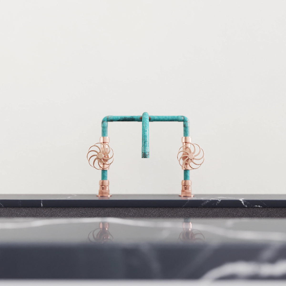 Verdigris and copper tap on kitchen surface