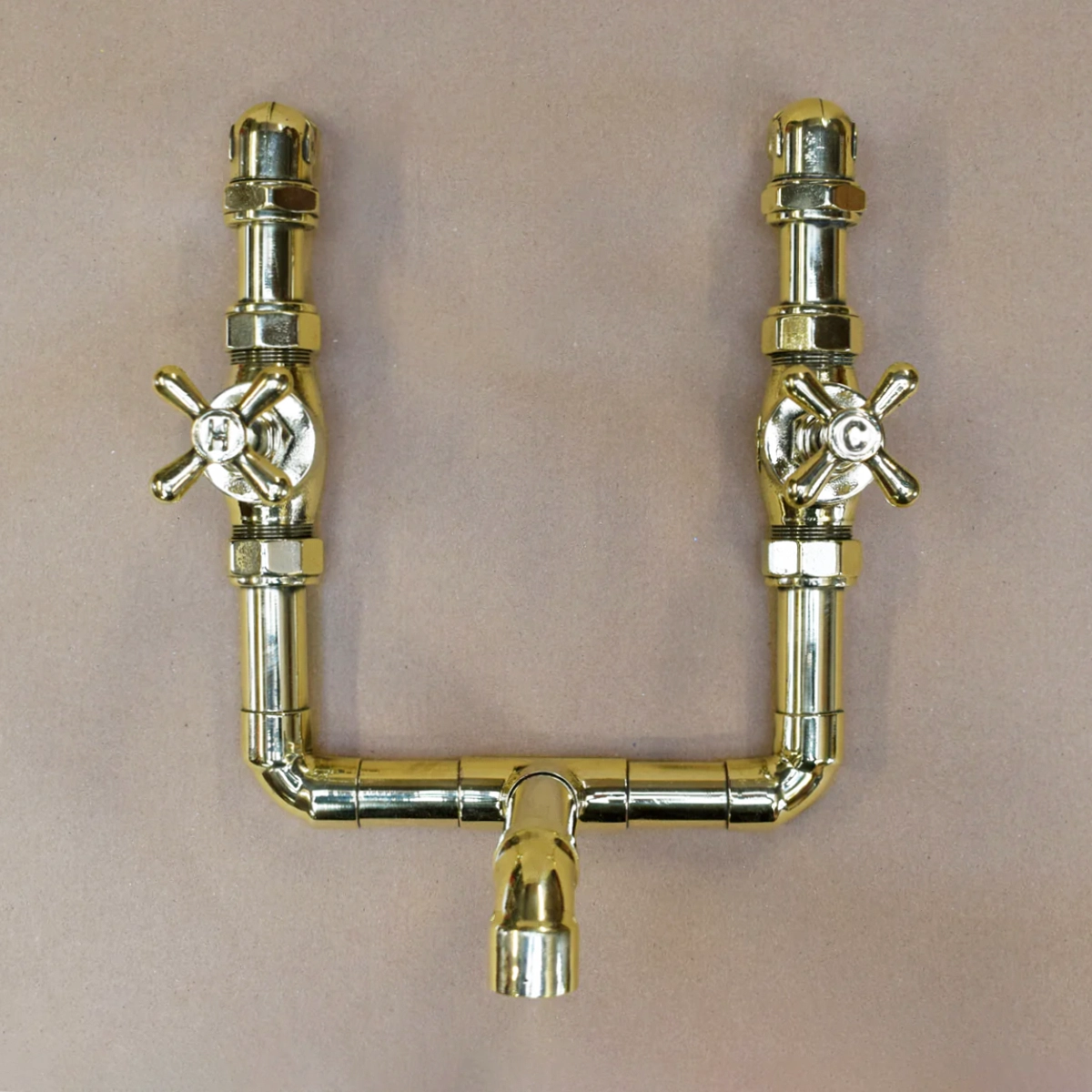 Brass wall mounted tap