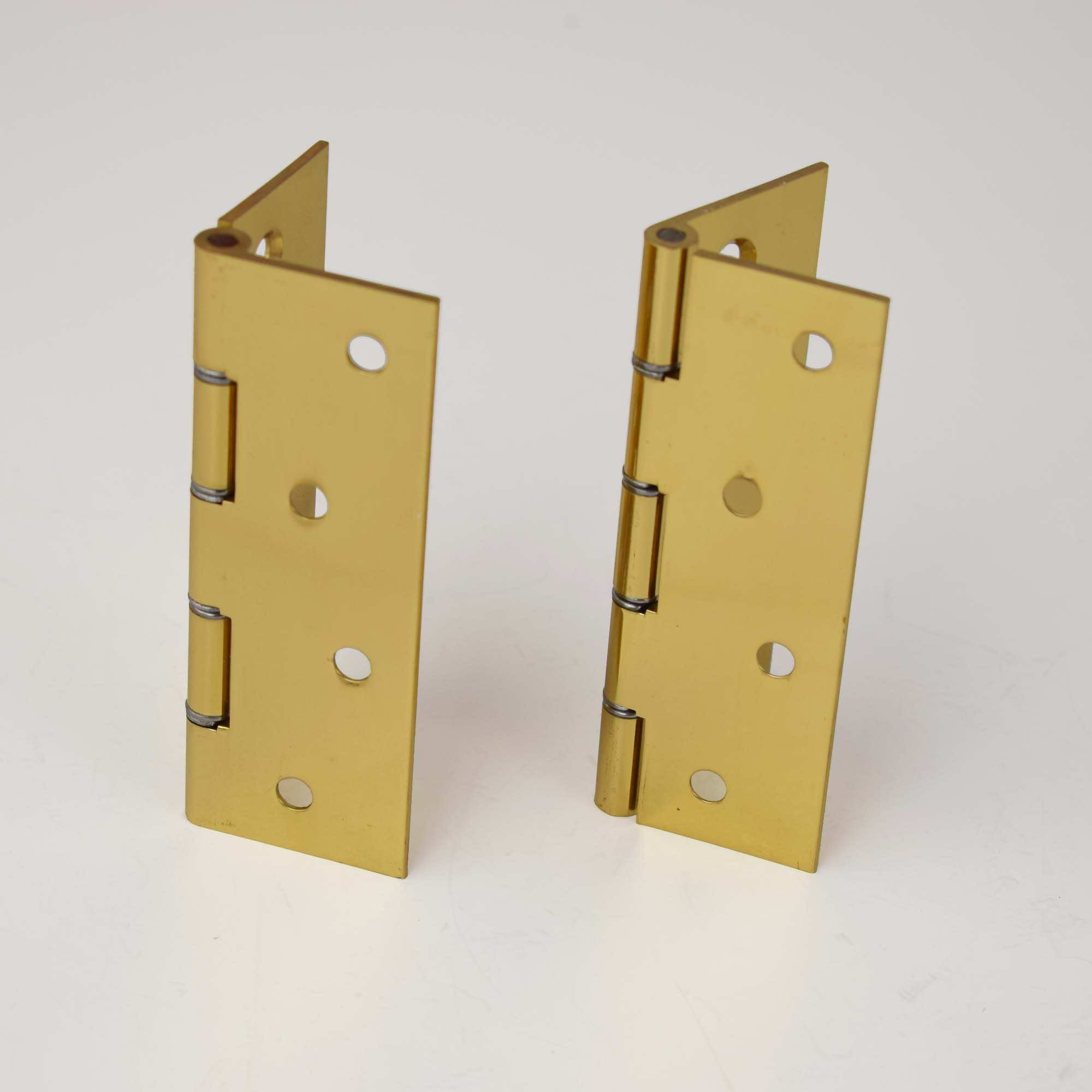 Pair of standing brass hinges