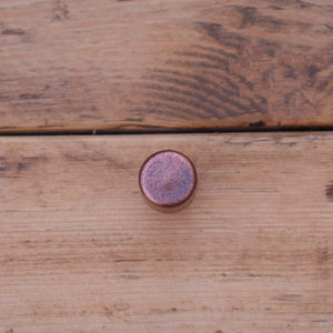 Aged Copper Raised Dimple Knob - On Wood Front Shot