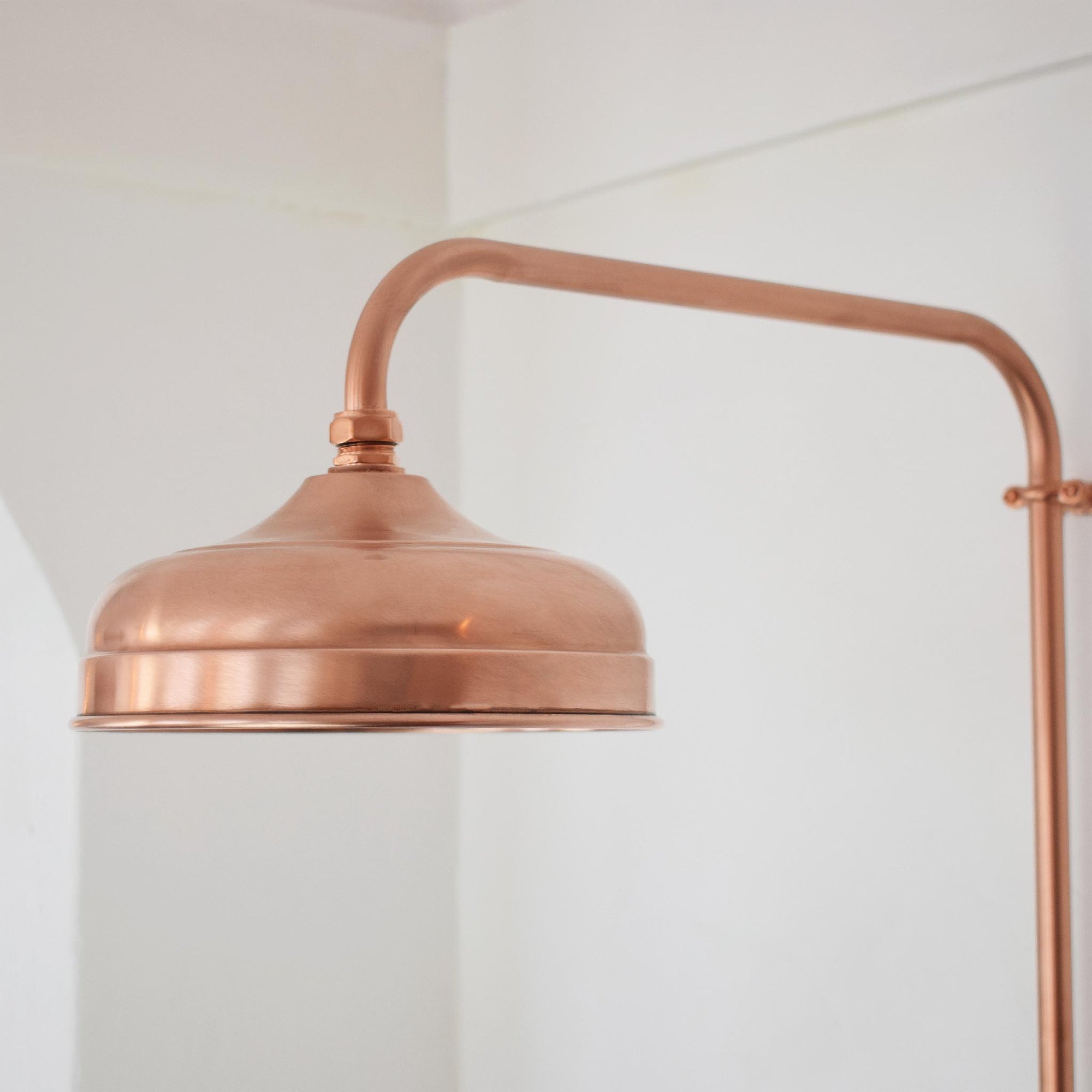 copper shower head on a Thermostatic shower valve