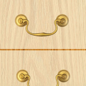 brass swan neck handle on wooden drawers