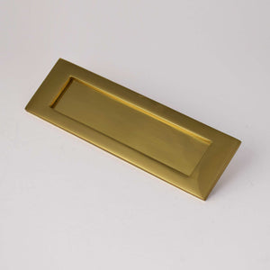 Brass letter plate angled view