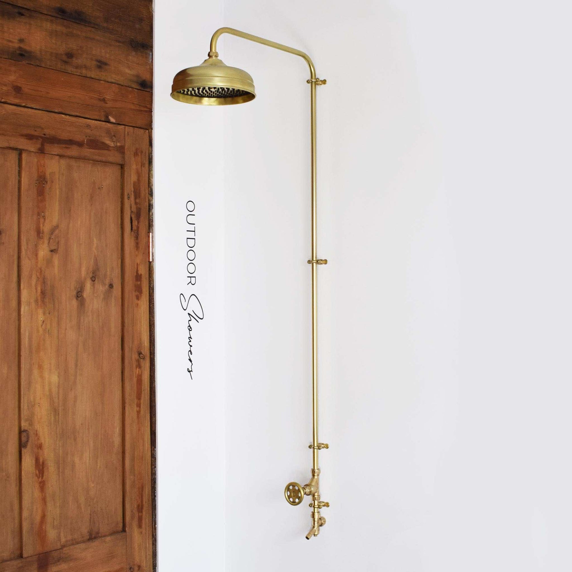 brass outdoor shower perfect for beach and seaside locations