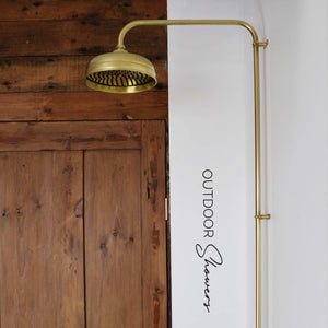 curved shower spout with a brass shower head, bring the spa experience to your backyard with our outdoor shower designs