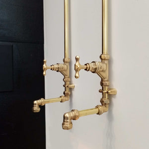 brass twin wall taps, brass taps, proper copper, on white background