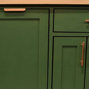 Folded Copper Lip Pull - On Green Cabinets