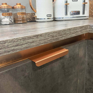 Folded Copper Lip Pull - On Grey Cabinets Angled
