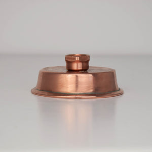 Upgrade your shower routine with this top-of-the-line copper shower head, which features adjustable settings to customize your