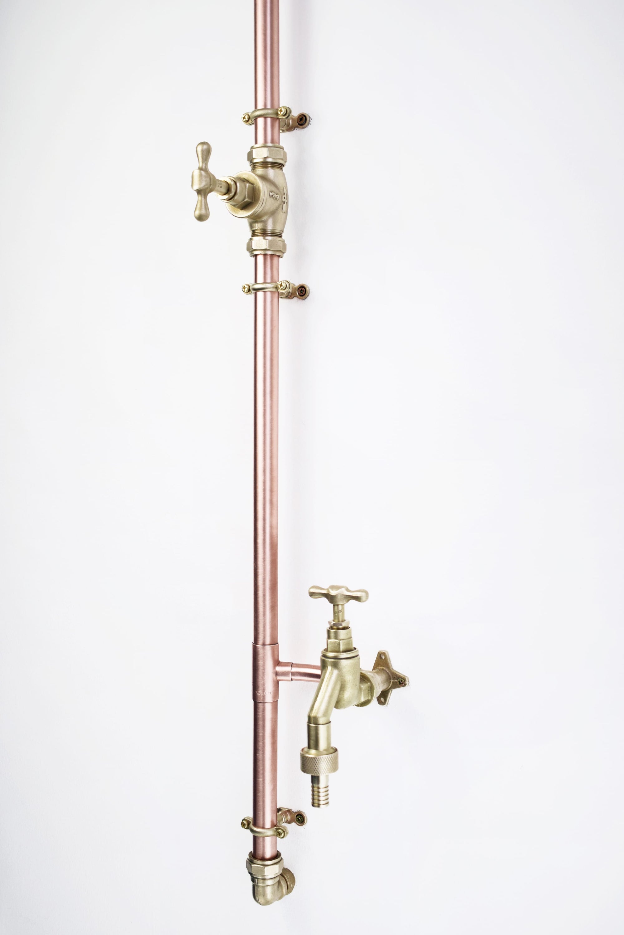 garden tap attachment featured on a copper shower perfect for an outdoor living space