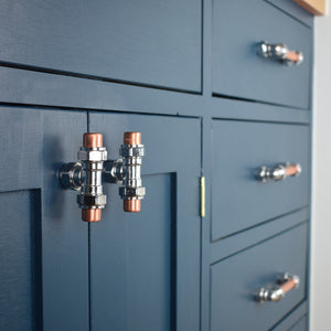 Chrome and Copper Knob - T-Shaped - On Blue Cabinets