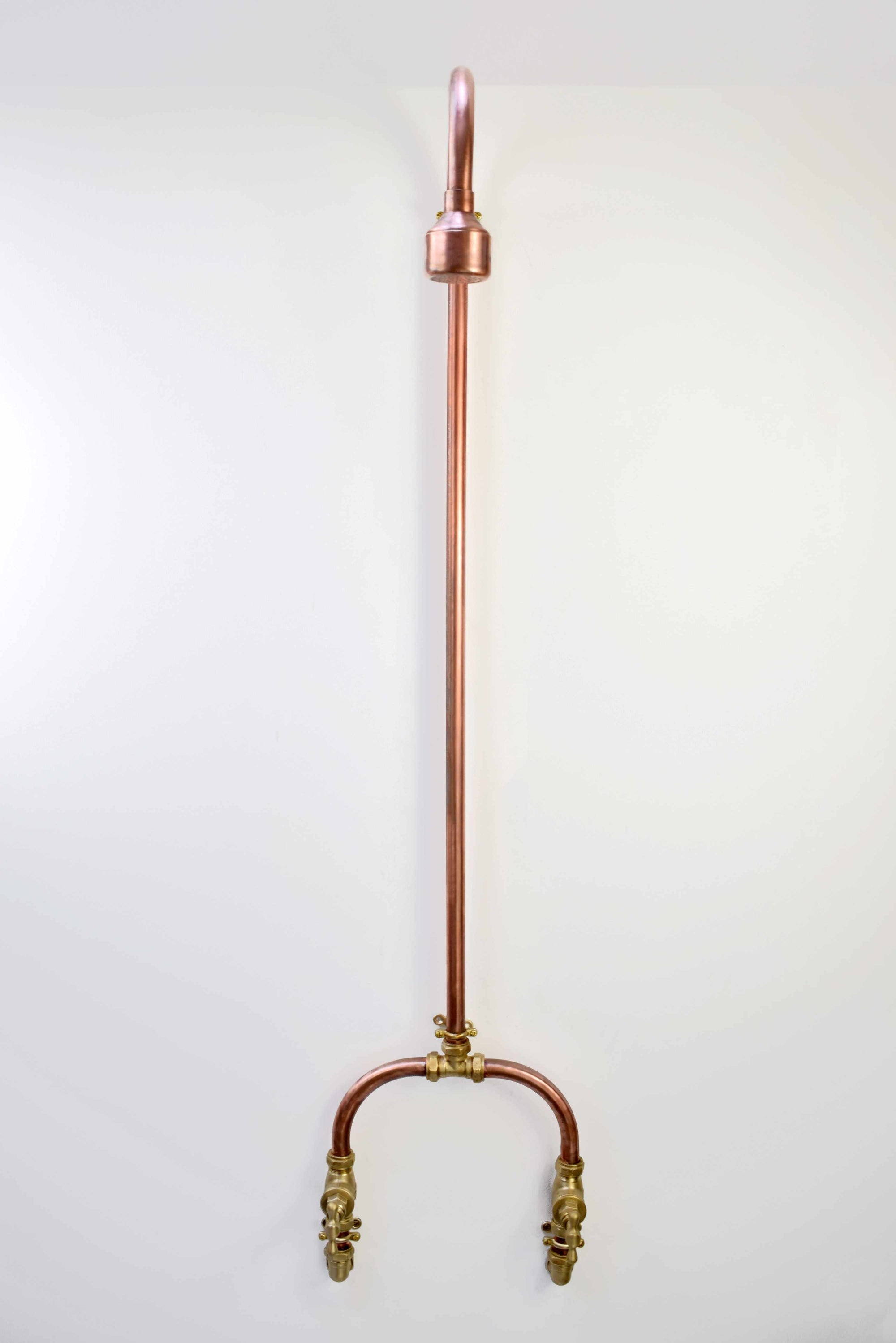 Curved copper shower with brass taps uk