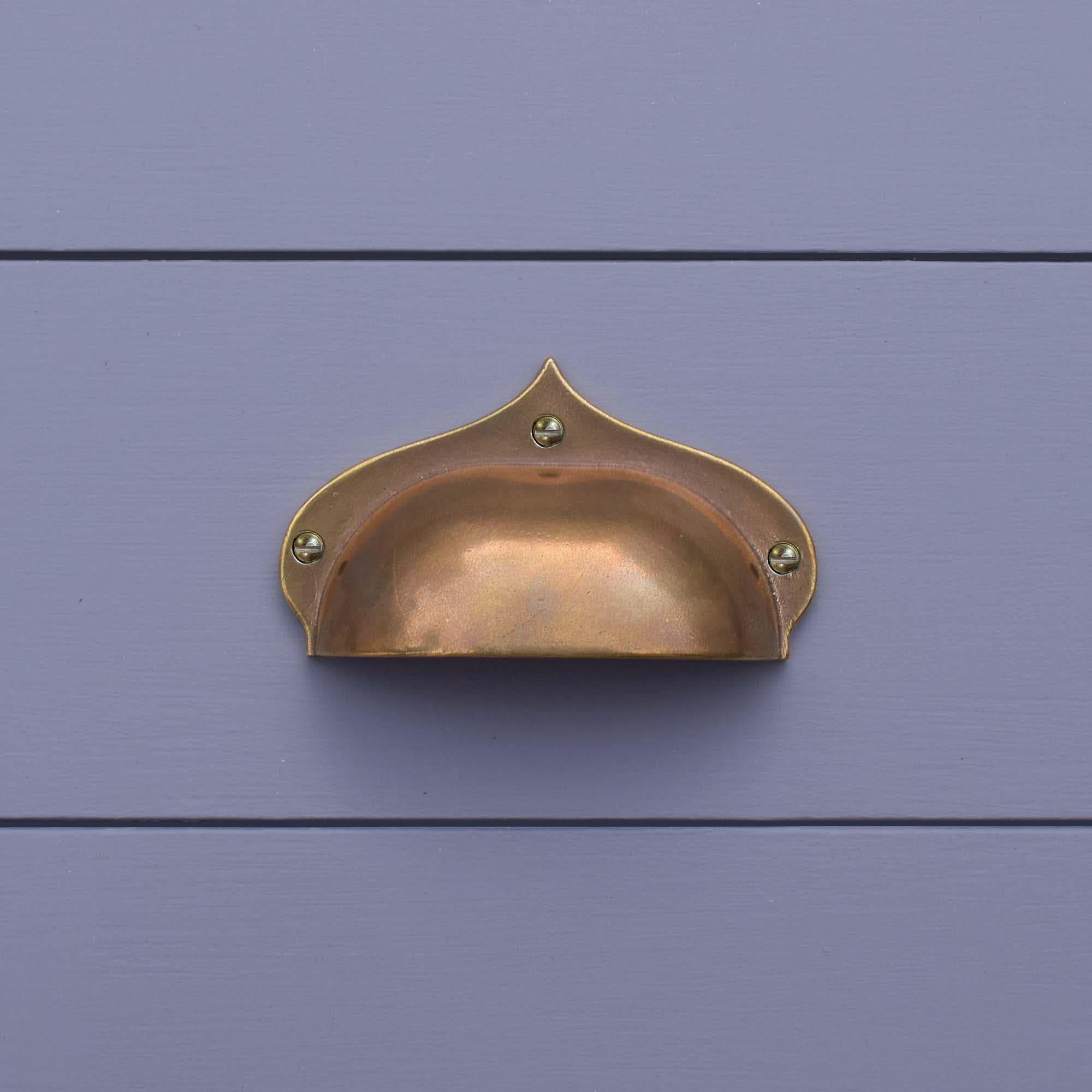 Royal Pavilion Cup Handle on blue kitchen drawers