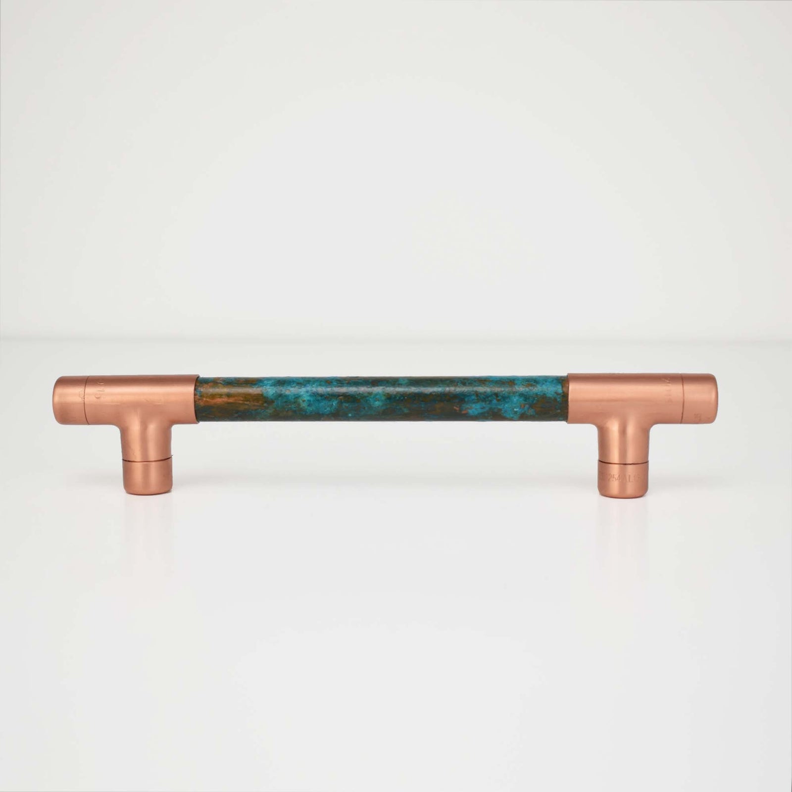 The Tormentil aged copper T-bar handle on shaker drawer