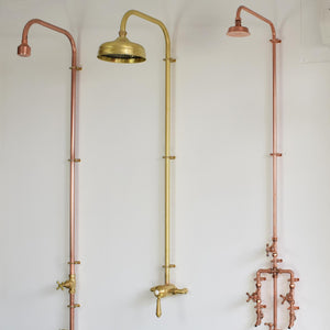 brass thermostatic shower featured in our Brighton bathroom showroom