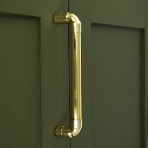 Brass U-Shaped Pull Handle on green cabinets
