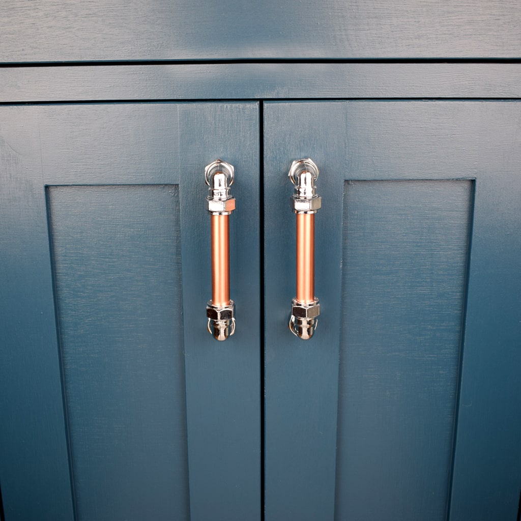 Chrome and Copper Handle / Pull - On blue cabinets