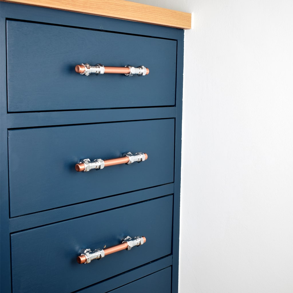 Chrome and Copper Handle - T-Shaped - On  blue drawers 