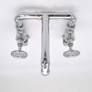 chunky chrome industrial taps above sink