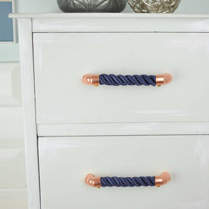 Copper and navy rope pull handle on cabinet drawers