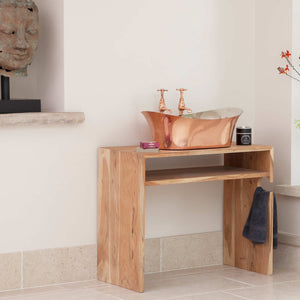 Handmade copper basin in stylish modern bathroom